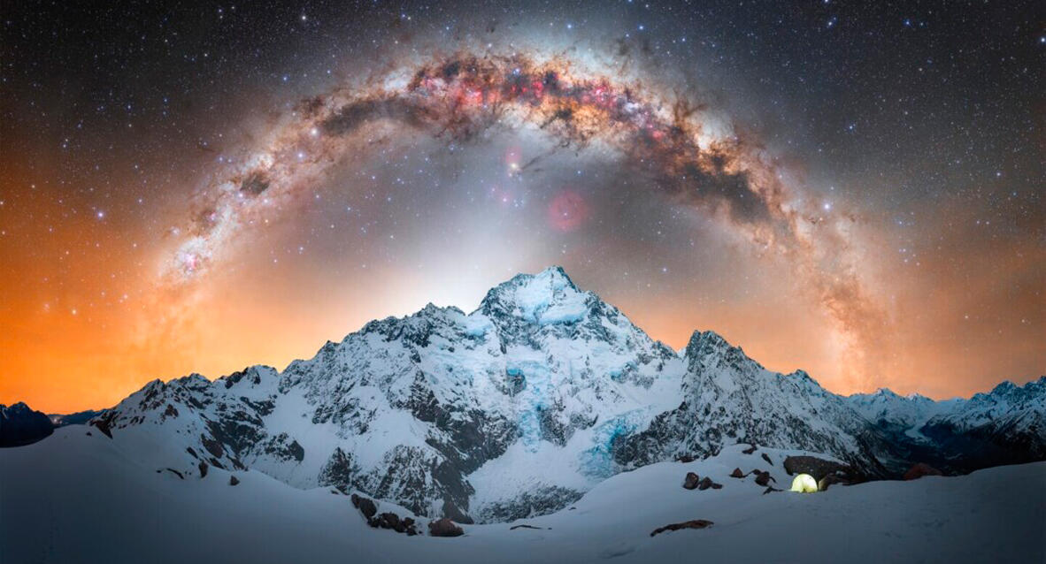 The Milky Way arching over snow-covered Aoraki / Mt. Cook, New Zealand
